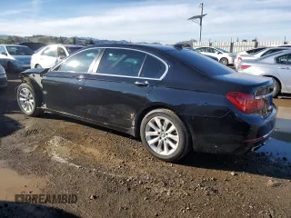 2015 BMW 7 Series 740Li with VIN WBAYE4C55FD947214, listed as a Copart auction lot 87261354 with 393,256 mi miles and Salvage Title. Bid and sale history available at DreamBid. Image 2.