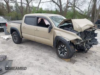 2017 Toyota Tacoma SR5 z VIN 5TFAZ5CN5HX045873, wystawiony jako IAAI lot #41946013 z przebiegiem 114 892 mil mil oraz . Historia ofert i sprzedaży dostępna na DreamBid. Obrazek 1.