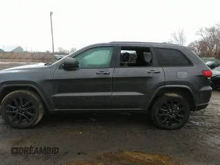 2020 Jeep Grand Cherokee Altitude with VIN 1C4RJFAGXLC211518, listed as a IAAI auction lot 41668994 with 130,371 mi miles. Bid and sale history available at carsss.com. Image 14.