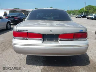 1995 Ford Crown Victoria with VIN 2FALP73W5SX140346, listed as a IAAI auction lot 41974429 with 166,540 mi miles. Bid and sale history available at carsss.com. Image 16.