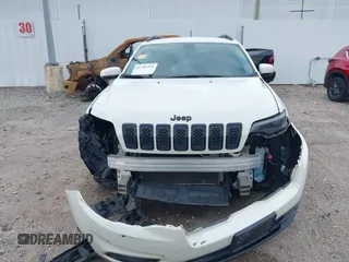 2019 Jeep Cherokee Latitude Plus with VIN 1C4PJLLBXKD405322, listed as a IAAI auction lot 41708104 with 93,295 mi miles and . Bid and sale history available at DreamBid. Image 12.
