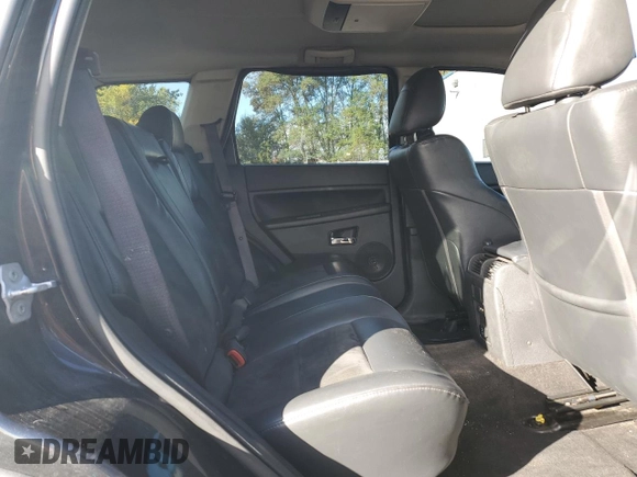 2008 Jeep Grand Cherokee SRT-8 with VIN 1J8HR78368C223775, listed as a Copart auction lot 76807824 with 156,937 mi miles and Clean Title. Bid and sale history available at carsss.com. Image 10.