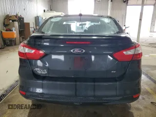 2013 Ford Focus SE with VIN 1FADP3F21DL348827, listed as a Copart auction lot 63589405 with 144,156 mi miles and Salvage title. Bid and sale history available at DreamBid. Image 6.