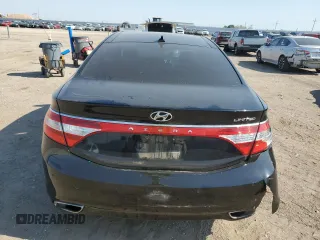 2014 Hyundai Azera Limited z VIN KMHFH4JG3EA424176, wystawiony jako Copart lot #55837825 z przebiegiem 133 781 mil mil oraz Szkoda całkowita • Salvage title. Historia ofert i sprzedaży dostępna na DreamBid. Obrazek 6.