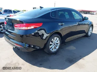2016 Kia Optima EX with VIN 5XXGU4L38GG032056, listed as a IAAI auction lot 42013867 with 145,466 mi miles. Bid and sale history available at carsss.com. Image 4.