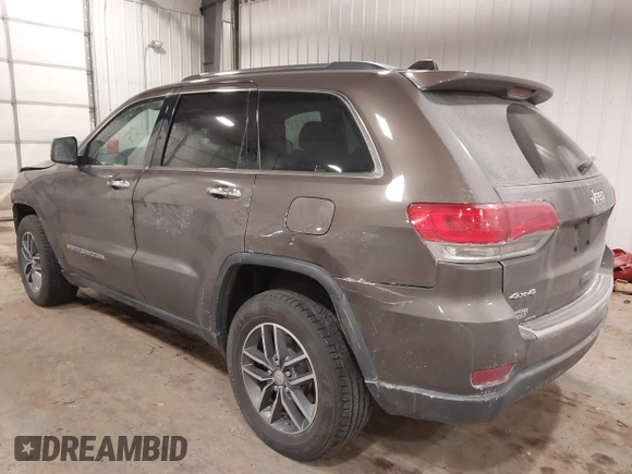 2018 Jeep Grand Cherokee Limited with VIN 1C4RJFBG2JC139502, listed as a IAAI auction lot 41372877 with 145,877 mi miles and . Bid and sale history available at DreamBid. Image 3.