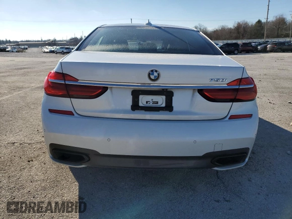2017 BMW 7 Series 750i with VIN WBA7F0C39HGM22030, listed as a Copart auction lot 87127484 with 110,634 mi miles and Salvage title. Bid and sale history available at DreamBid. Image 6.