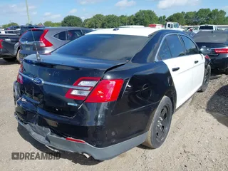 2014 Ford Police Interceptor with VIN 1FAHP2MK8EG185666, listed as a IAAI auction lot 42608018 with 141,523 mi miles and . Bid and sale history available at DreamBid. Image 4.