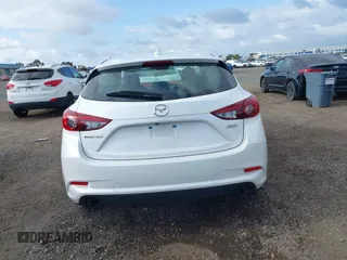2018 Mazda 3 Touring with VIN 3MZBN1L31JM225108, listed as a IAAI auction lot 41959304 with 74,933 mi miles. Bid and sale history available at carsss.com. Image 17.