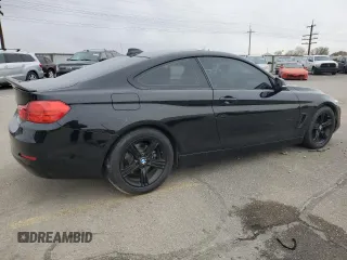 2014 BMW 4 Series 428i with VIN WBA3N7C58EF719741, listed as a Copart auction lot 81573274 with 113,095 mi miles and Salvage Title. Bid and sale history available at DreamBid. Image 3.