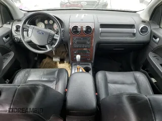 2005 Ford Freestyle Limited z VIN 1FMDK061X5GA13201, wystawiony jako Copart lot #48371765 z przebiegiem 134 155 mil mil oraz Szkoda całkowita • Salvage title. Historia ofert i sprzedaży dostępna na DreamBid. Obrazek 8.