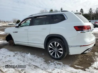2021 Volkswagen Atlas SEL Premium R-Line with VIN 1V2FR2CA8MC561355, listed as a Copart auction lot 46217855 with 57,076 mi miles and Salvage title. Bid and sale history available at DreamBid. Image 2.
