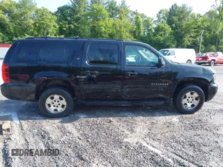 2011 Chevrolet Suburban LT z VIN 1GNSKJE34BR400810, wystawiony jako IAAI lot #42379234 z przebiegiem 273 228 mil mil oraz . Historia ofert i sprzedaży dostępna na DreamBid. Obrazek 13.