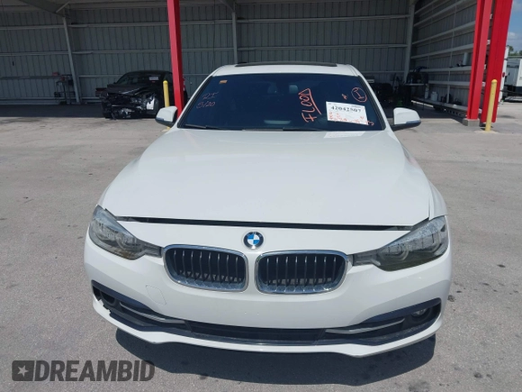 2018 BMW 3 Series 330i with VIN WBA8B9G52JNU57283, listed as a IAAI auction lot 42042507 with 51,740 mi miles and . Bid and sale history available at DreamBid. Image 6.
