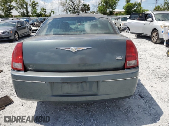 2005 Chrysler 300 Touring z VIN 2C3JA53G95H546536, wystawiony jako Copart lot #60667575 z przebiegiem 163 625 mil mil oraz Szkoda całkowita • Salvage title. Historia ofert i sprzedaży dostępna na DreamBid. Obrazek 6.