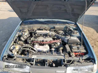 1992 Mazda 626 z VIN 1YVGD22B5N5212605, wystawiony jako Copart lot #74945704 z przebiegiem 99 659 mil mil oraz Tytuł czysty. Historia ofert i sprzedaży dostępna na DreamBid. Obrazek 11.