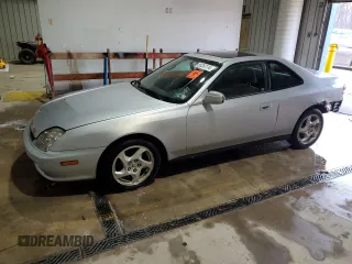 2001 Honda Prelude with VIN JHMBB62421C001624, listed as a Copart auction lot 85250114 with 208,529 mi miles and Salvage Title. Bid and sale history available at DreamBid. Image 1.