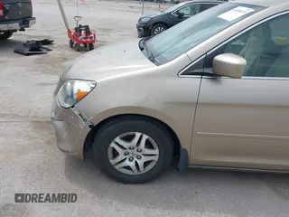 2005 Honda Odyssey EX with VIN 5FNRL38475B029026, listed as a IAAI auction lot 42489079 with 156,075 mi miles and . Bid and sale history available at DreamBid. Image 13.