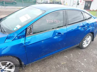 2018 Ford Focus SE z VIN 1FADP3F29JL235302, wystawiony jako IAAI lot #42262964 z przebiegiem 85 127 mil mil oraz . Historia ofert i sprzedaży dostępna na DreamBid. Obrazek 6.