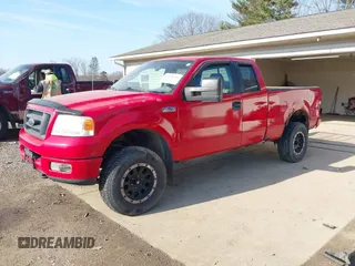 2005 Ford F-150 STX with VIN 1FTRX14W35NA68052, listed as a IAAI auction lot 41768704 with 146,336 mi miles. Bid and sale history available at carsss.com. Image 2.