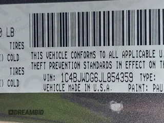 2018 Jeep Wrangler Unlimited Sport S with VIN 1C4BJWDG6JL854359, listed as a IAAI auction lot 42423170 with 84,470 mi miles and . Bid and sale history available at DreamBid. Image 9.