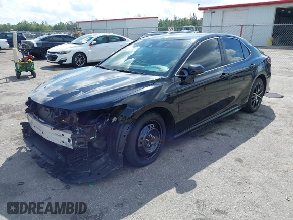 2023 Toyota Camry SE with VIN 4T1G11AK6PU741172, listed as a IAAI auction lot 41599909 with 56,668 mi miles and . Bid and sale history available at DreamBid. Image 2.