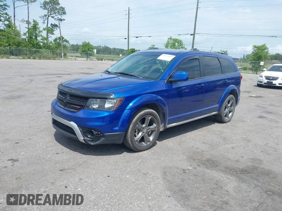 2015 Dodge Journey Crossroad with VIN 3C4PDCGG9FT617772, listed as a IAAI auction lot 42123413 with 146,778 mi miles and . Bid and sale history available at DreamBid. Image 2.