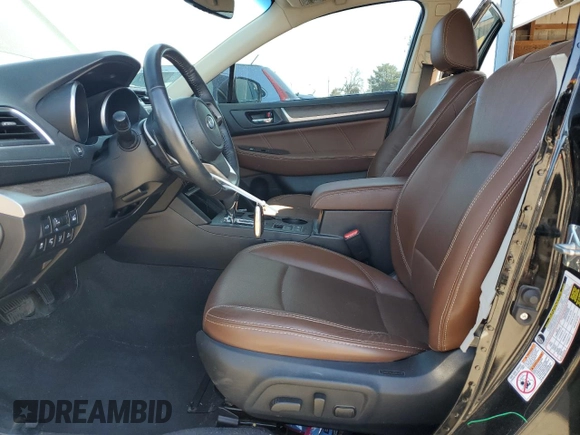 2019 Subaru Outback Touring z VIN 4S4BSETC3K3203788, wystawiony jako Copart lot #52637195 z przebiegiem 65 248 mil mil oraz Szkoda całkowita • Salvage title. Historia ofert i sprzedaży dostępna na DreamBid. Obrazek 7.