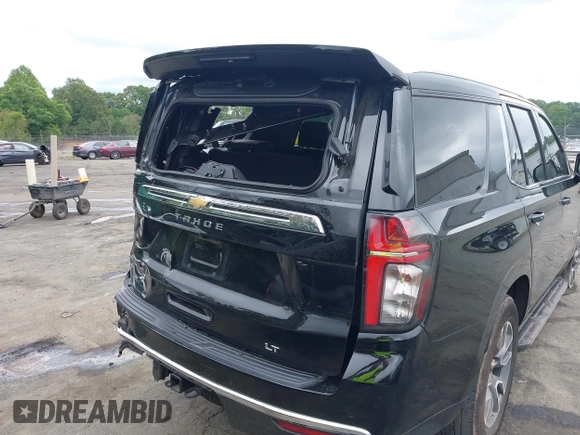 2023 Chevrolet Tahoe LT with VIN 1GNSKNKD8PR105849, listed as a IAAI auction lot 42308786 with 51,748 mi miles and . Bid and sale history available at DreamBid. Image 18.