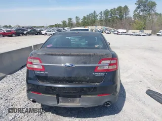 2014 Ford Taurus Limited with VIN 1FAHP2F80EG105147, listed as a IAAI auction lot 41899174 with 137,451 mi miles and . Bid and sale history available at DreamBid. Image 16.