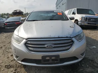 2014 Ford Taurus SEL with VIN 1FAHP2E8XEG184523, listed as a Copart auction lot 67643764 with 157,851 mi miles and Salvage Title. Bid and sale history available at carsss.com. Image 5.