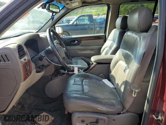 2003 GMC Envoy SLT z VIN 1GKET16S136186780, wystawiony jako Copart lot #55927155 z przebiegiem 163 099 mil mil oraz Szkoda całkowita • Salvage title. Historia ofert i sprzedaży dostępna na DreamBid. Obrazek 7.