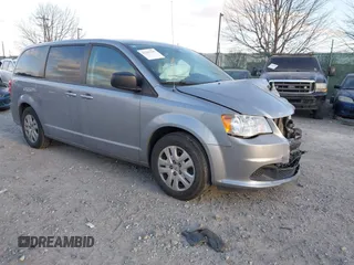 2018 Dodge Grand Caravan SE z VIN 2C4RDGBG9JR364276, wystawiony jako IAAI lot #41343237 z przebiegiem 110 893 mil mil oraz . Historia ofert i sprzedaży dostępna na DreamBid. Obrazek 1.