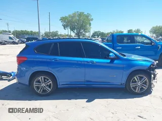 2017 BMW X1 sDrive28i with VIN WBXHU7C31H5H33281, listed as a IAAI auction lot 41814792 with 55,756 mi miles. Bid and sale history available at carsss.com. Image 14.