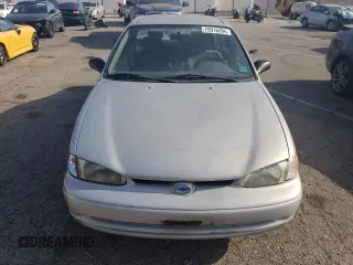 2001 Chevrolet Prizm z VIN 1Y1SK52811Z447352, wystawiony jako Copart lot #73916394 z przebiegiem 89 265 mil mil oraz Szkody całkowita. Historia ofert i sprzedaży dostępna na DreamBid. Obrazek 5.