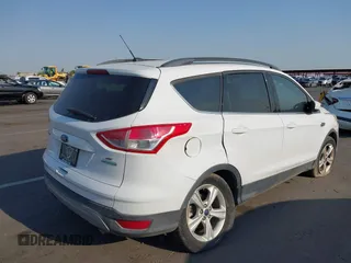 2016 Ford Escape SE z VIN 1FMCU0GXXGUC13444, wystawiony jako IAAI lot #39566364 z przebiegiem 162 059 mil mil oraz . Historia ofert i sprzedaży dostępna na DreamBid. Obrazek 4.