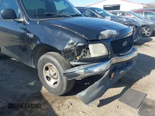 2003 Ford F-150 XL with VIN 1FTRF17223NA54202, listed as a IAAI auction lot 41535299 with Not Provided miles and . Bid and sale history available at DreamBid. Image 6.