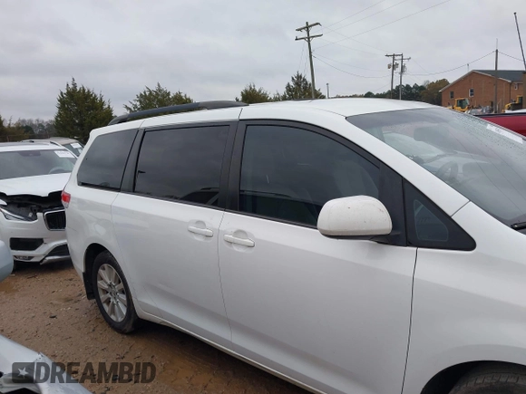 2012 Toyota Sienna LE with VIN 5TDJK3DC3CS048579, listed as a IAAI auction lot 41055074 with 202,791 mi miles. Bid and sale history available at carsss.com. Image 13.