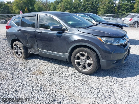 2018 Honda CR-V EX with VIN 5J6RW2H58JL034618, listed as a IAAI auction lot 40374390 with 95,255 mi miles. Bid and sale history available at carsss.com. Image 1.