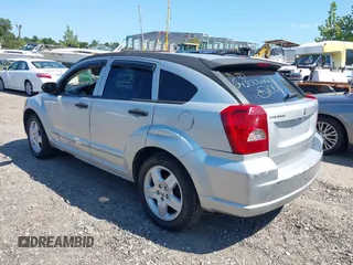 2008 Dodge Caliber SXT with VIN 1B3HB48B48D594124, listed as a IAAI auction lot 40282351 with 142,615 mi miles. Bid and sale history available at carsss.com. Image 3.