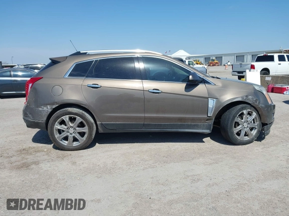 2015 Cadillac SRX Performance Collection with VIN 3GYFNCE31FS598109, listed as a IAAI auction lot 41788267 with 172,488 mi miles and . Bid and sale history available at DreamBid. Image 13.