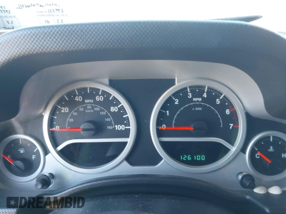 2010 Jeep Wrangler Unlimited Sahara with VIN 1J4HA5H17AL140941, listed as a IAAI auction lot 42004203 with 126,100 mi miles. Bid and sale history available at carsss.com. Image 7.