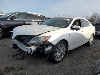 2013 Lincoln MKS EcoBoost with VIN 1LNHL9FT7DG604430, listed as a Copart auction lot 87918755 with 0 mi miles and Salvage Title. Bid and sale history available at carsss.com. Image 1.