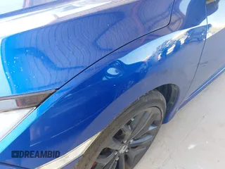 2020 Honda Civic Si z VIN 2HGFC1E50LH705586, wystawiony jako IAAI lot #42317630 z przebiegiem 34 904 mil mil oraz . Historia ofert i sprzedaży dostępna na DreamBid. Obrazek 6.