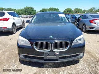 2012 BMW 7 Series 750i with VIN WBAKA8C50CCY37892, listed as a IAAI auction lot 42080313 with 148,058 mi miles. Bid and sale history available at carsss.com. Image 6.