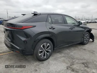 2024 Lexus RZ 450e Premium z VIN JTJAAAABXRA026441, wystawiony jako Copart lot #56064095 z przebiegiem 422 mil mil oraz Szkody całkowita. Historia ofert i sprzedaży dostępna na DreamBid. Obrazek 3.