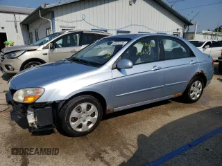 2008 Kia Spectra EX with VIN KNAFE121285506562, listed as a Copart auction lot 60253135 with 232,975 mi miles and Salvage title. Bid and sale history available at DreamBid. Image 1.