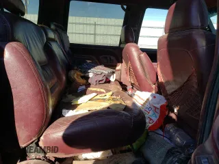 1997 GMC Suburban z VIN 3GKFK16R3VG511306, wystawiony jako Copart lot #78504814 z przebiegiem 287 079 mil mil oraz Szkoda całkowita • Salvage title. Historia ofert i sprzedaży dostępna na DreamBid. Obrazek 11.