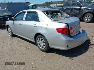 2010 Toyota Corolla with VIN 1NXBU4EE4AZ343702, listed as a IAAI auction lot 42036321 with 157,084 mi miles. Bid and sale history available at carsss.com. Image 3.