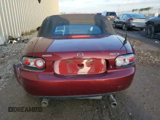 2007 Mazda MX-5 Miata Sport z VIN JM1NC25F970124896, wystawiony jako Copart lot #83624394 z przebiegiem 62 735 mil mil oraz Szkoda całkowita • Salvage title. Historia ofert i sprzedaży dostępna na DreamBid. Obrazek 6.